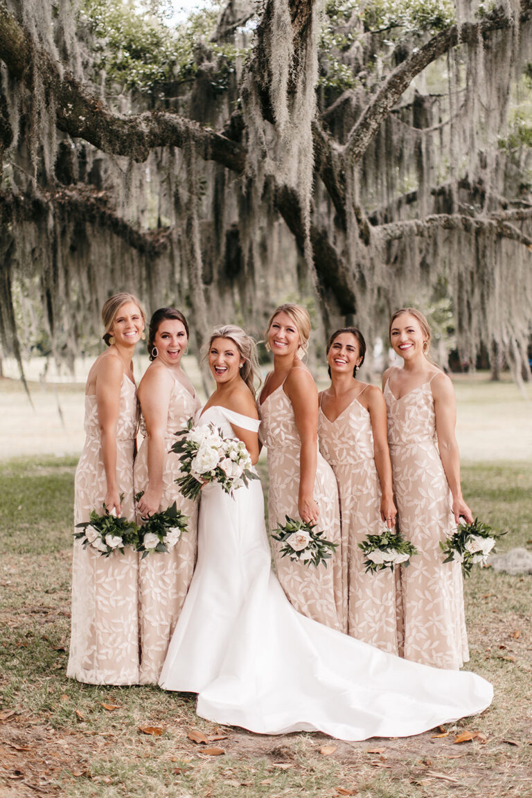 All beaded bridesmaid dresses hemmed by hand. Bride: sides taken in, hemmed, and bustle