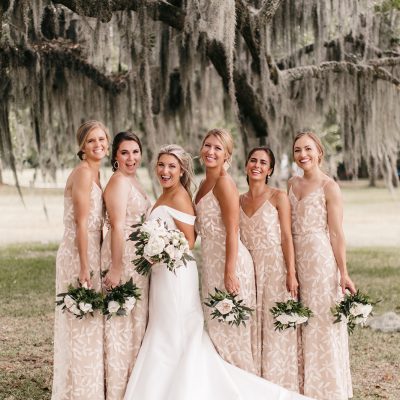 All beaded bridesmaid dresses hemmed by hand. Bride: sides taken in, hemmed, and bustle